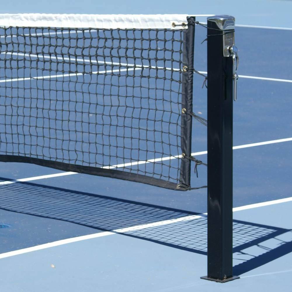 Black tennis net and metal tennis post winder handle/tennis post reel.  Stock Photo